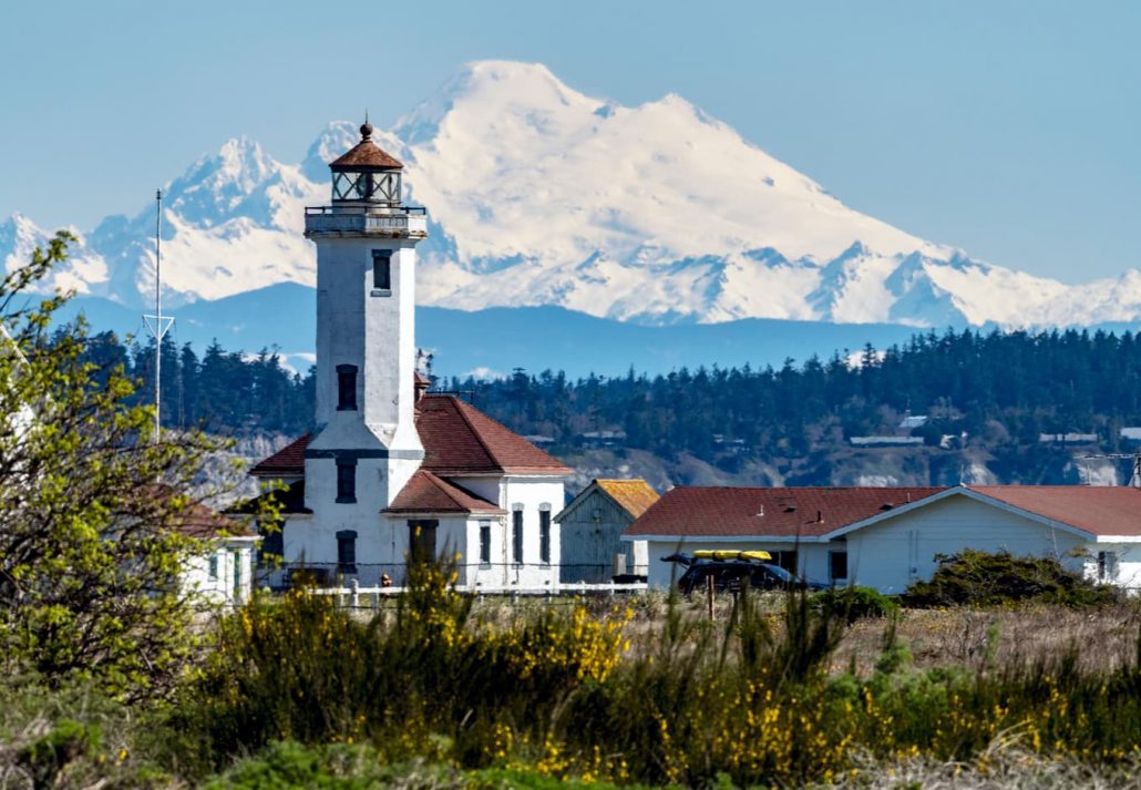 Mount Baker and lighthouse in Port Townsend, Washington.